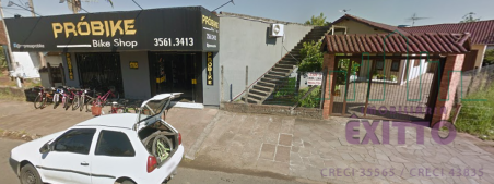 Casa com loja comercial a venda